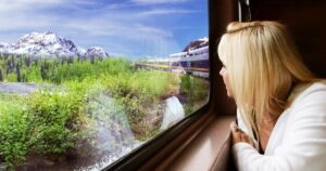women looks thrugh train window